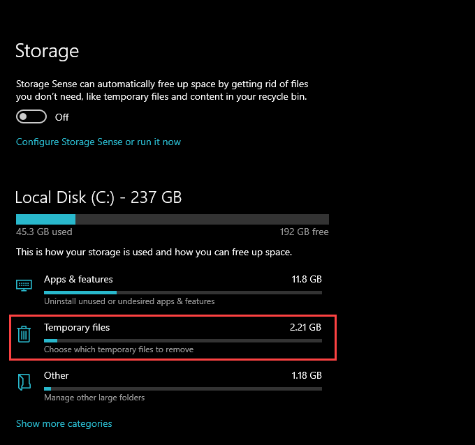 Screenshot demonstrating the process of deleting temporary files: Opening the Start menu, selecting Settings, choosing System, switching to the Storage side-tab, and selecting Temporary files to view a list of temporary file types for deletion.